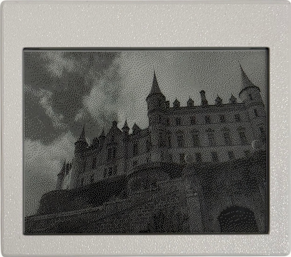 Paper Portrait e-ink display showing a black-and-white photograph of a castle